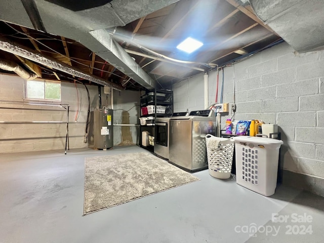 basement with independent washer and dryer and water heater