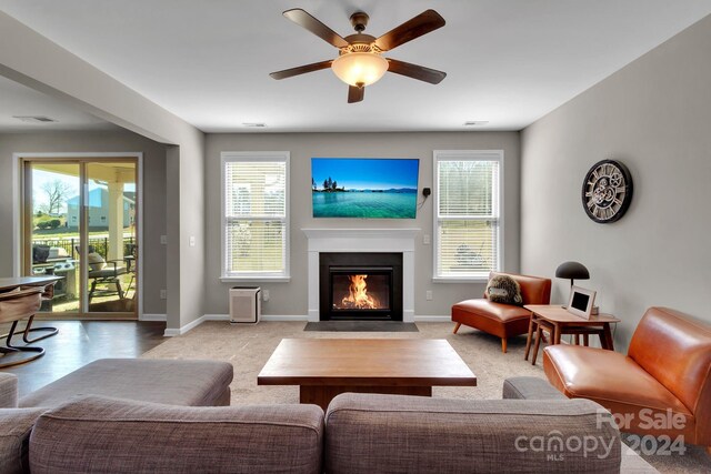 living room featuring ceiling fan