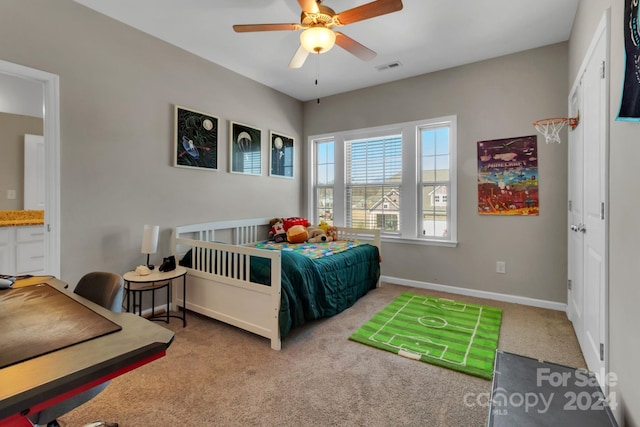 carpeted bedroom featuring ceiling fan