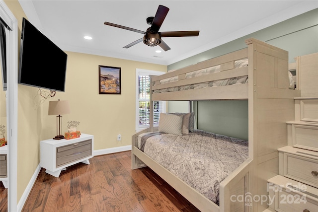 bedroom featuring ceiling fan and dark hardwood / wood-style floors