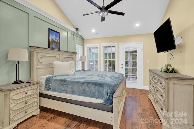 bedroom with ceiling fan, wood-type flooring, lofted ceiling, and access to outside