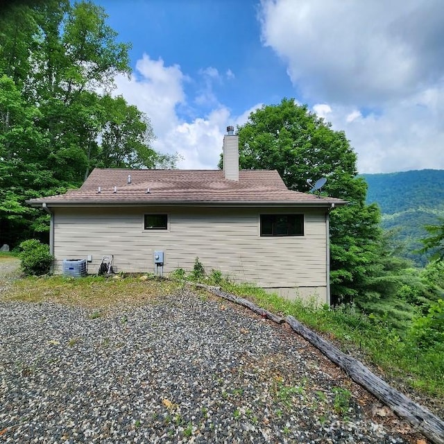 view of home's exterior featuring central AC unit