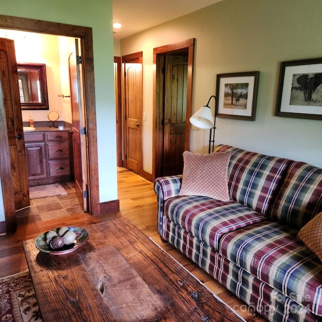 living room with light hardwood / wood-style floors