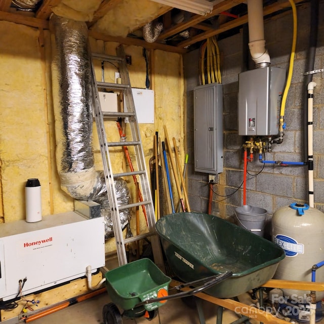 utility room with electric panel and water heater