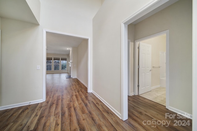 hallway featuring dark hardwood / wood-style floors