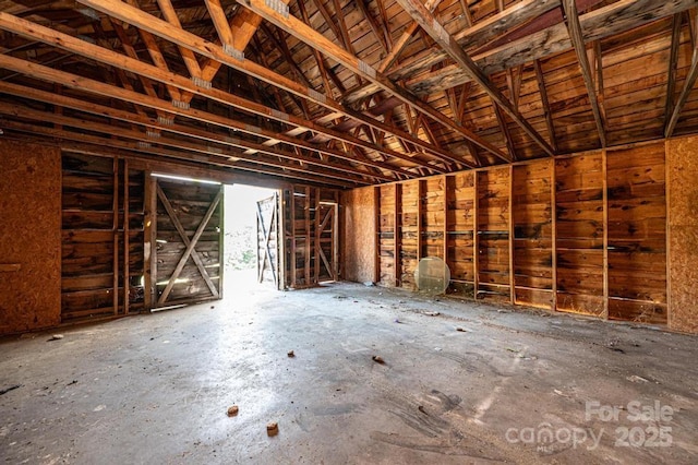 miscellaneous room featuring vaulted ceiling