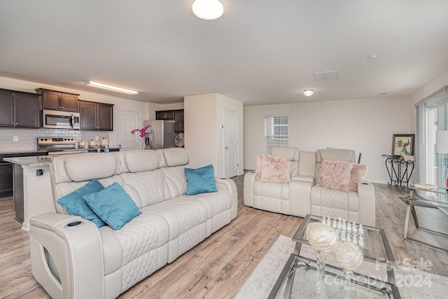 living room featuring light hardwood / wood-style flooring