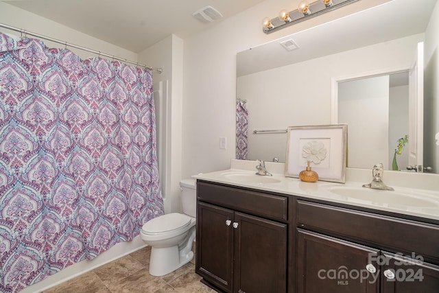 bathroom with a shower with curtain, vanity, and toilet