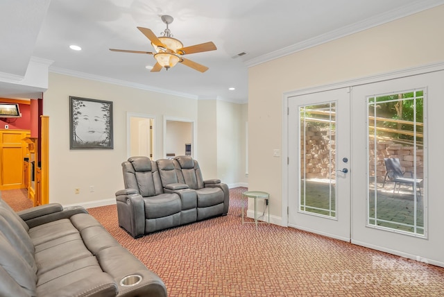 living room featuring ceiling fan, crown molding, french doors, and carpet floors