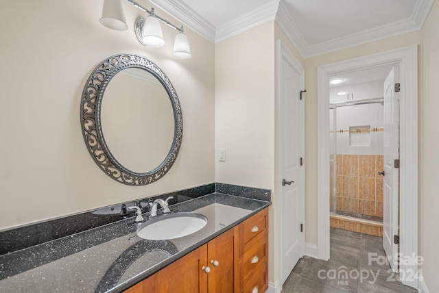 full bathroom with baseboards, a shower stall, vanity, and crown molding