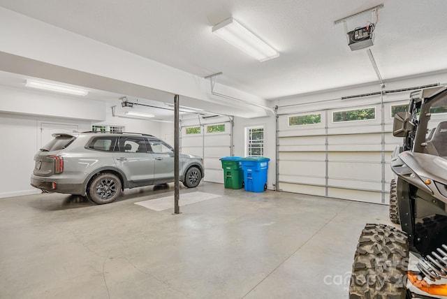 garage featuring a garage door opener