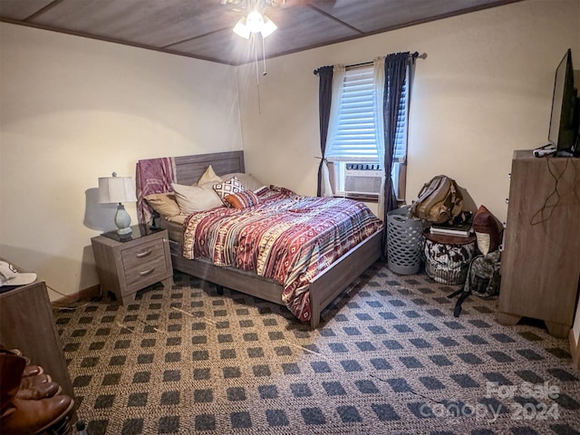 bedroom with ceiling fan, cooling unit, and wood ceiling