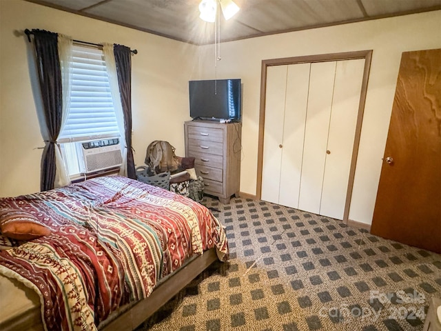 bedroom featuring carpet, cooling unit, a closet, and ceiling fan