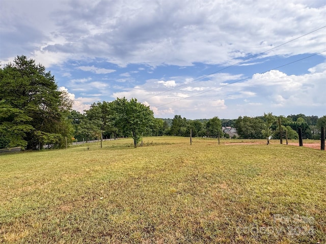 view of yard with a rural view