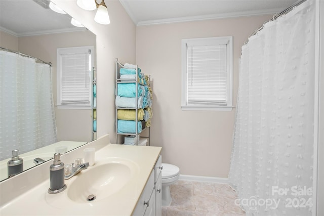 bathroom with toilet, tile patterned flooring, crown molding, and vanity