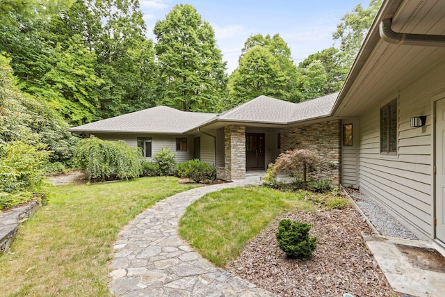 view of front of house with a front lawn