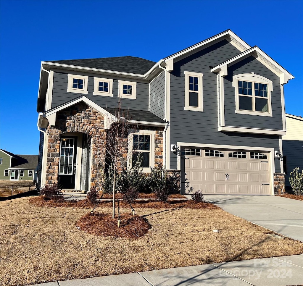 view of front of house with a garage