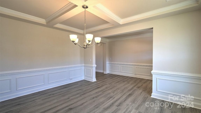 spare room with beamed ceiling, a chandelier, crown molding, and dark wood-type flooring