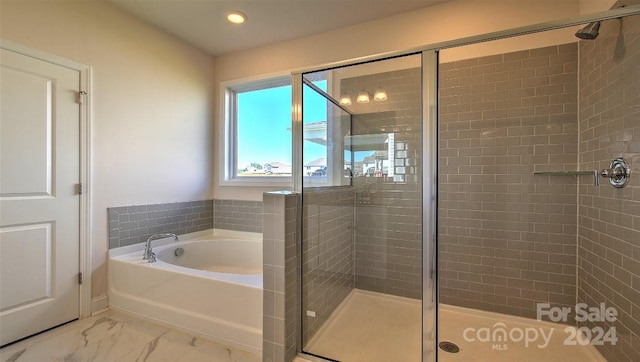 bathroom featuring independent shower and bath and tile patterned floors