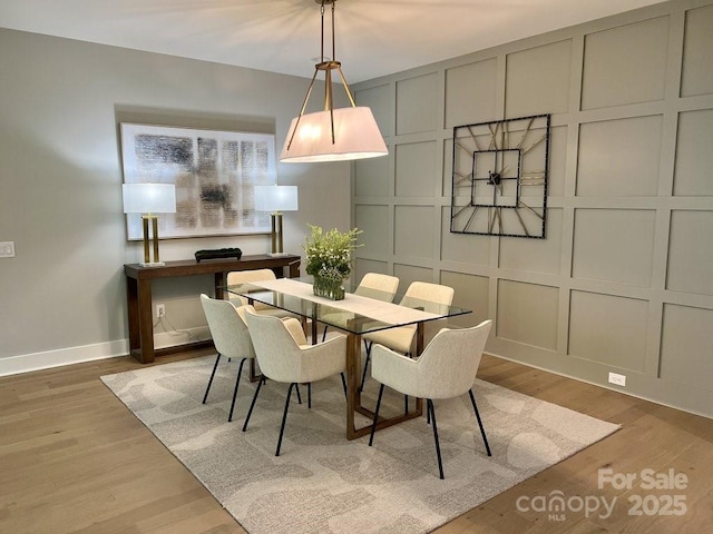 dining area featuring hardwood / wood-style floors