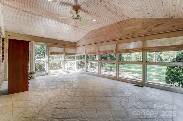 unfurnished sunroom with vaulted ceiling, ceiling fan, and wood ceiling