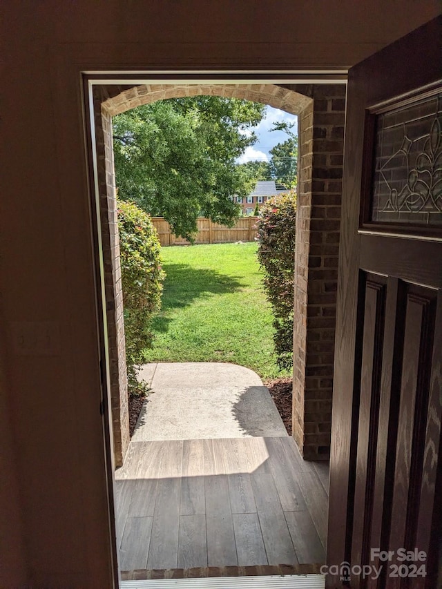 doorway to outside featuring wood-type flooring