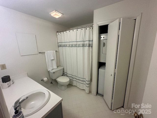 bathroom with vanity, stacked washer and dryer, toilet, and curtained shower