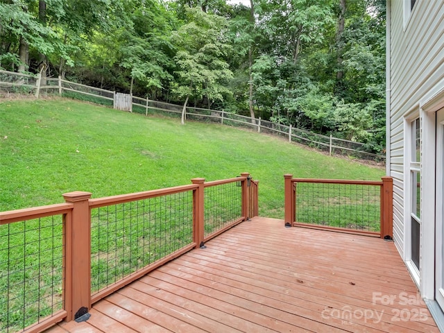 deck featuring a lawn