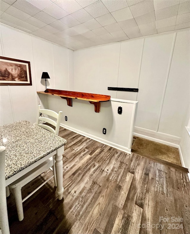 laundry area with dark hardwood / wood-style flooring and washer hookup