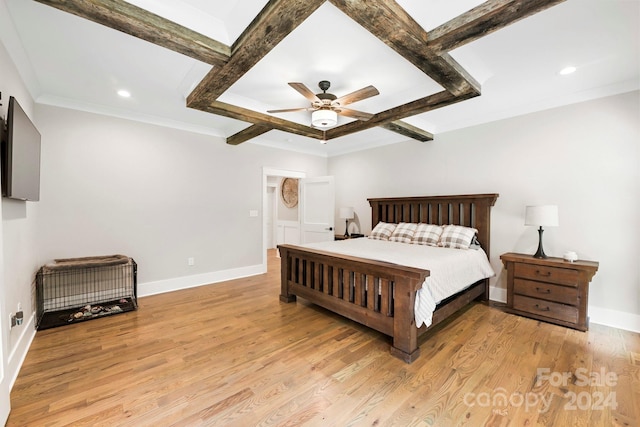 bedroom with beamed ceiling, light wood-type flooring, and ceiling fan