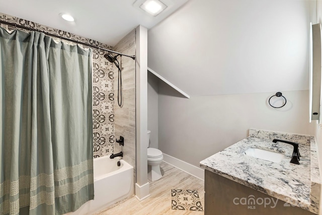 full bathroom featuring toilet, vaulted ceiling, vanity, hardwood / wood-style flooring, and shower / bathtub combination with curtain