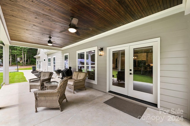 view of patio featuring french doors, ceiling fan, and an outdoor hangout area