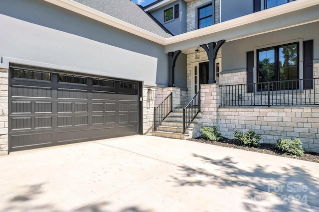 property entrance with a garage