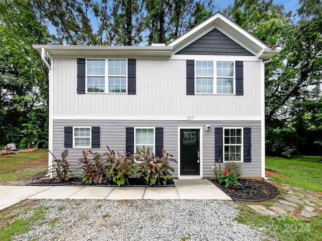 view of front of property featuring a patio