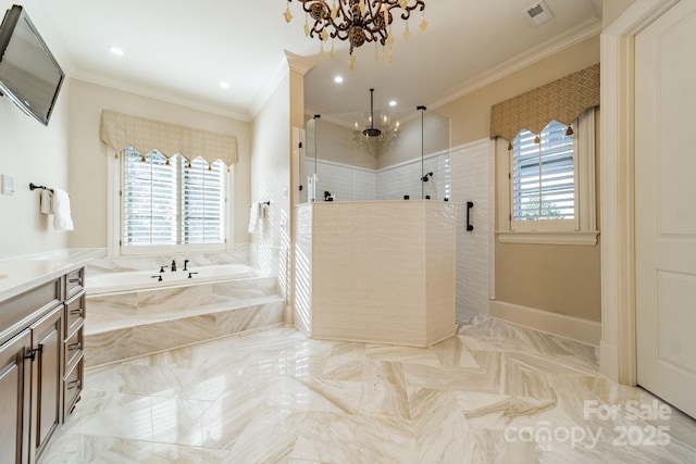 bathroom with an inviting chandelier, crown molding, independent shower and bath, and vanity