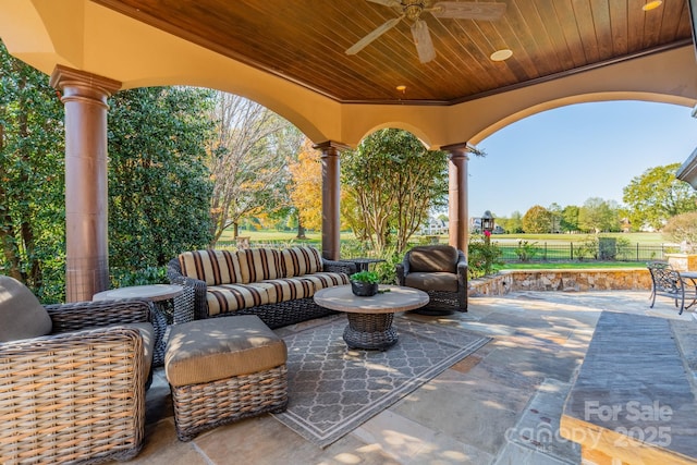 view of patio / terrace with ceiling fan and outdoor lounge area