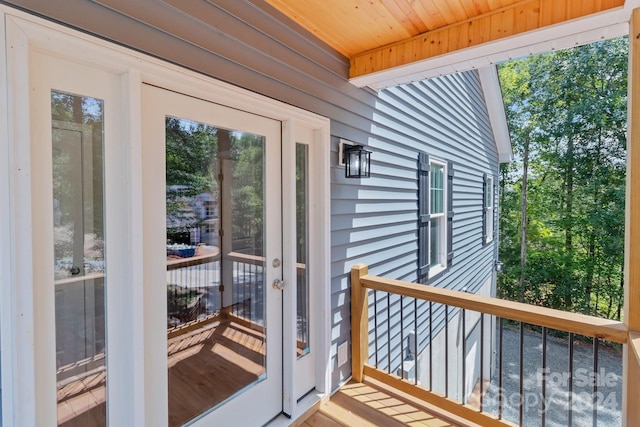 entryway with wood ceiling