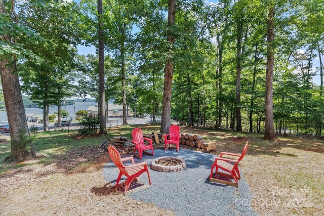 view of patio / terrace with a fire pit