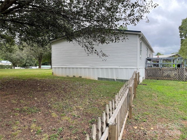 view of home's exterior featuring a lawn