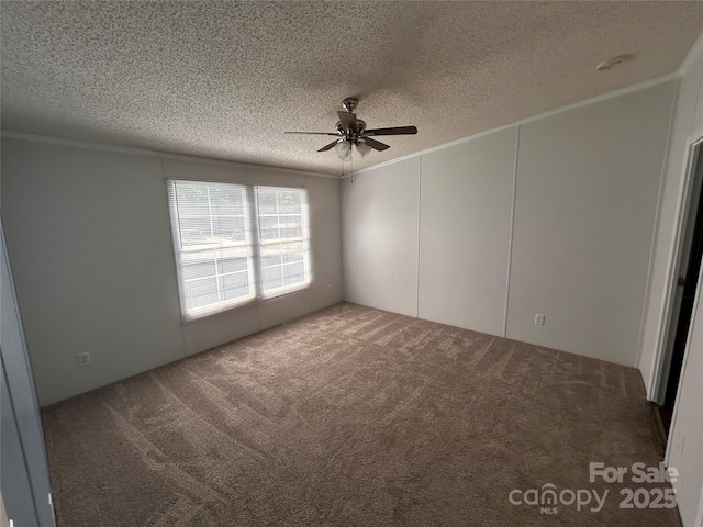 6261 Burnhurst Ln, Denver, NC 28037 - carpeted empty room with ceiling fan, a textured ceiling, and ornamental molding