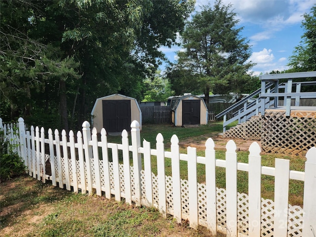 6261 Burnhurst Ln, Denver, NC 28037 - view of front of home with a storage unit, fence, and an outdoor structure