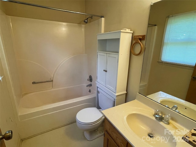 full bathroom with toilet, vanity, and tub / shower combination