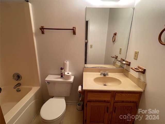 full bathroom featuring toilet, vanity, and tub / shower combination