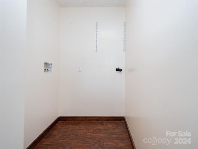 laundry area with hardwood / wood-style floors and washer hookup