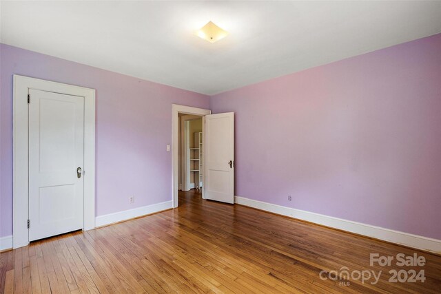 unfurnished bedroom with light hardwood / wood-style flooring