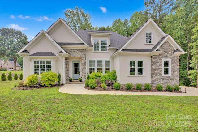 view of front of house with stone siding, a front yard, and stucco siding