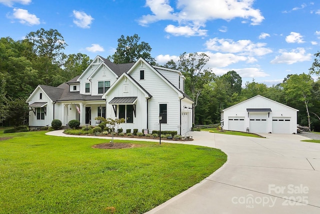 modern inspired farmhouse with a front yard and a garage