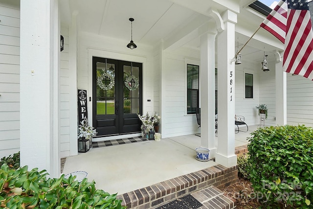 property entrance featuring covered porch