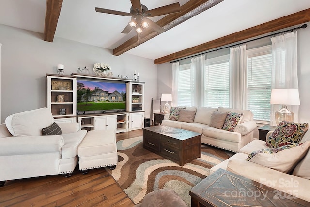 living room with ceiling fan, beam ceiling, and wood-type flooring