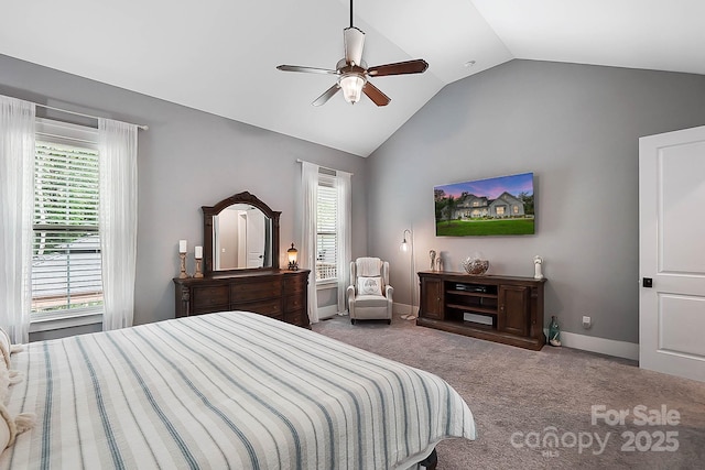 carpeted bedroom featuring multiple windows, ceiling fan, and lofted ceiling